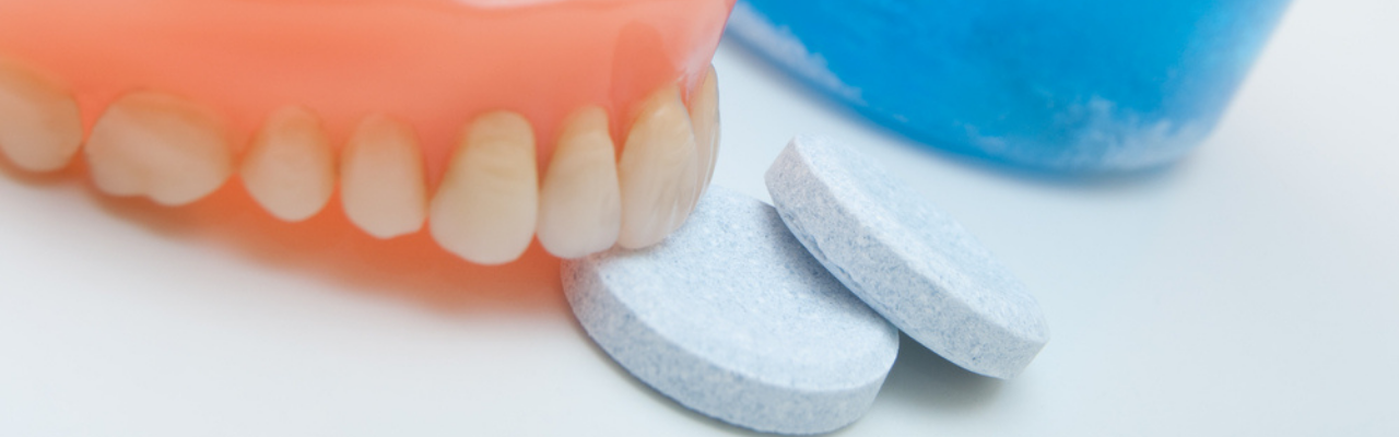 How should we clean dentures ? Banner